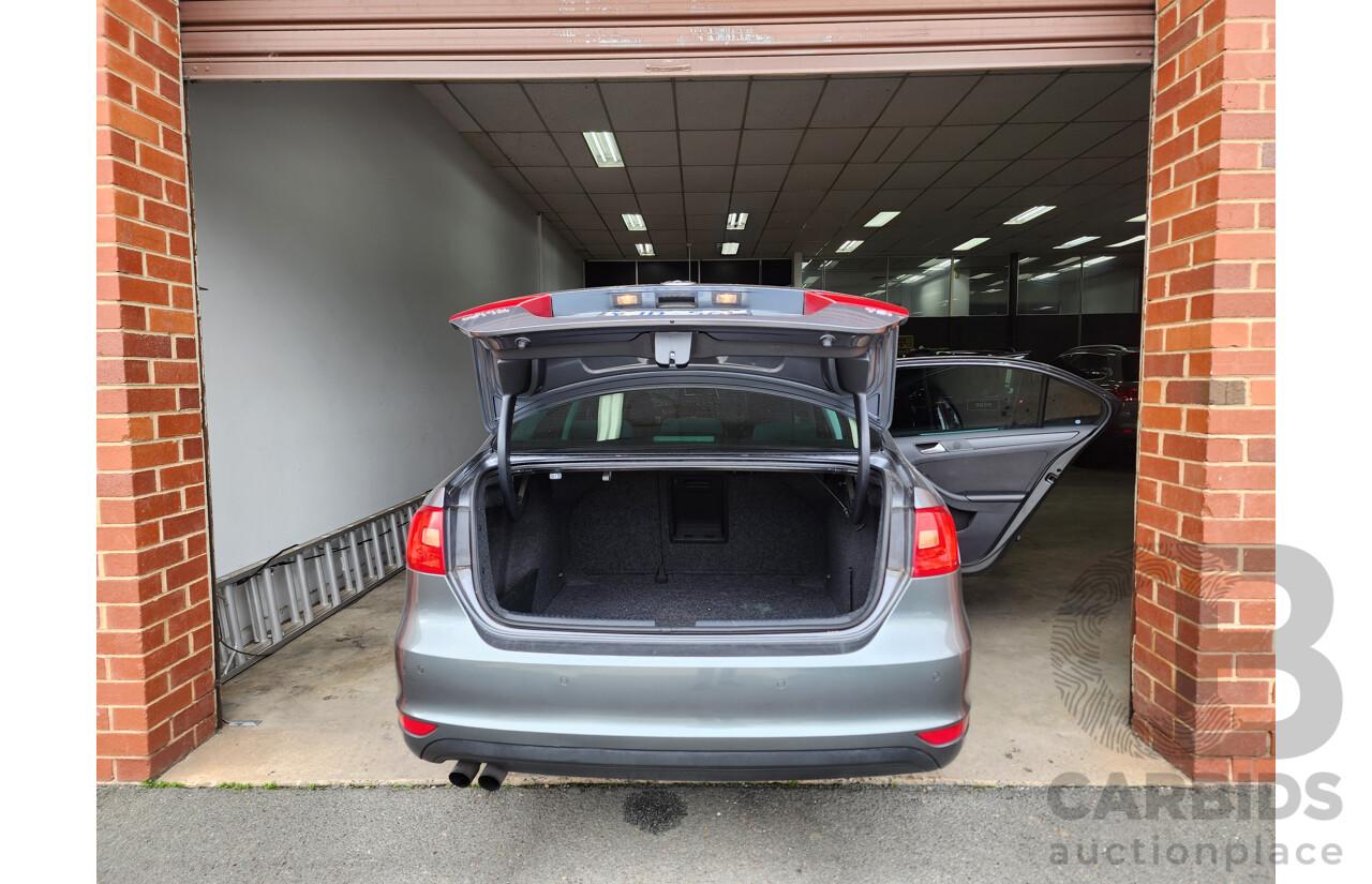 10/2012 Volkswagen Jetta 118 TSI Comfortline 1KM MY13 4d Sedan Grey 1.4L