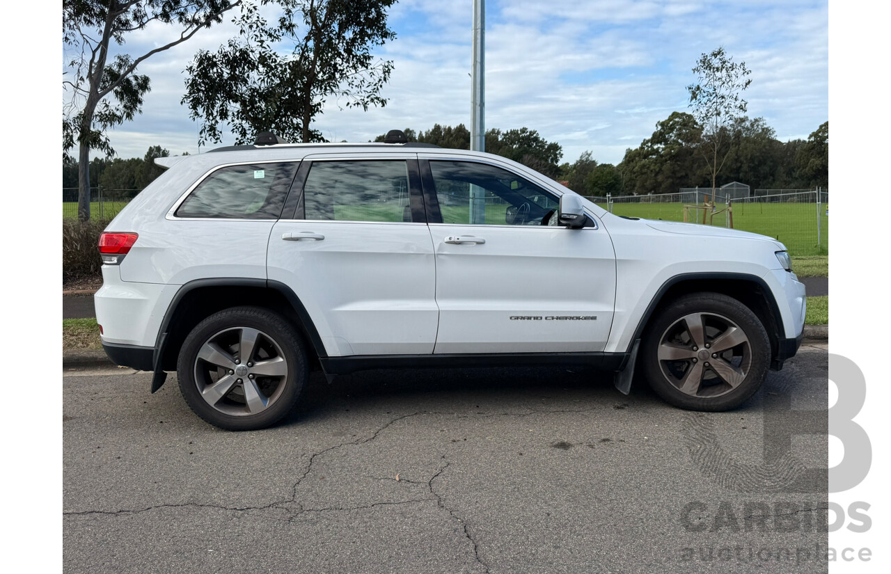 09/2014 Jeep Grand Cherokee LAREDO (4x2) RWD WK MY15 4D Wagon White 3.6L