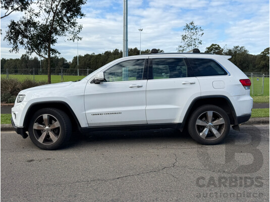 1661554 · 09/2014 Jeep Grand Cherokee LAREDO (4x2) RWD WK MY15 4D Wagon White 3.6L