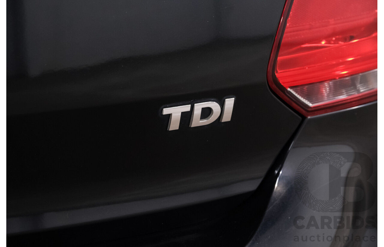 4/2012 Volkswagen Polo 66 TDI Comfortline MY12 FWD 5d Hatchback Black 1.6L