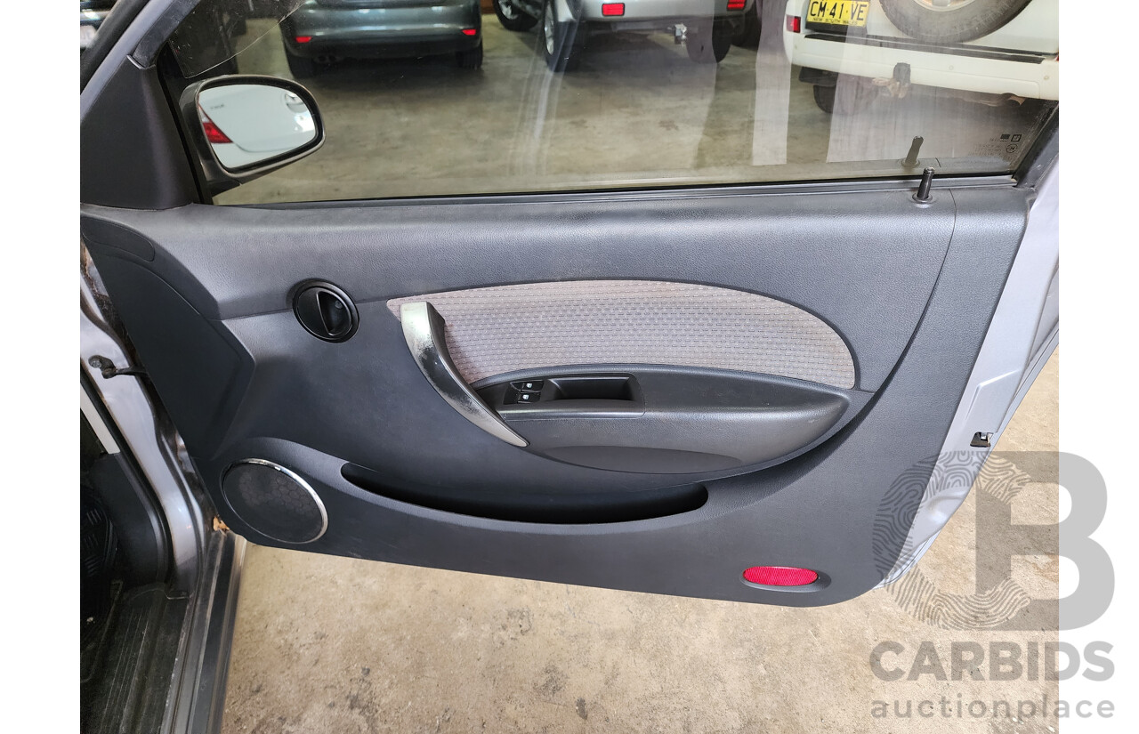 06/2009 Holden Barina  TK MY09 3d Hatchback Grey 1.6L