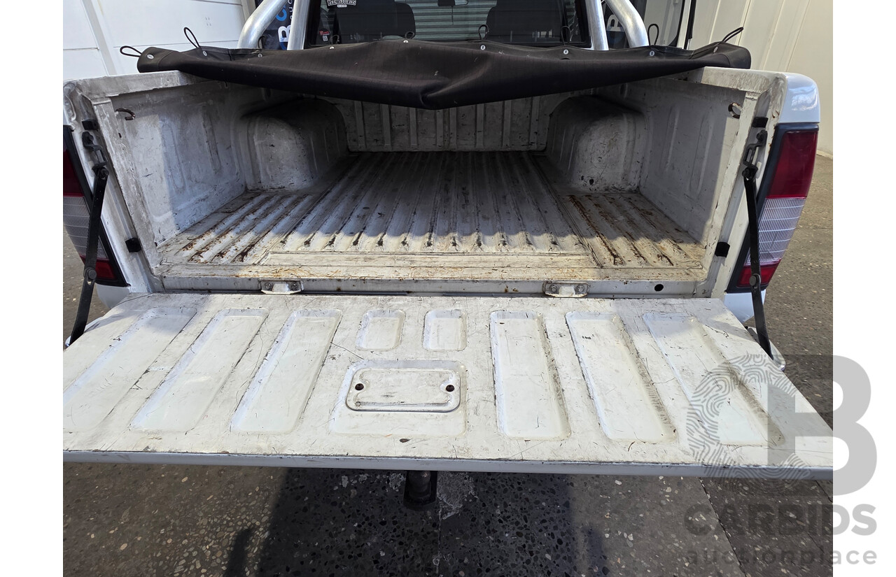 2/2012 Nissan Navara ST-R 4x4 D22 Series 5 Dual Cab White 2.5L