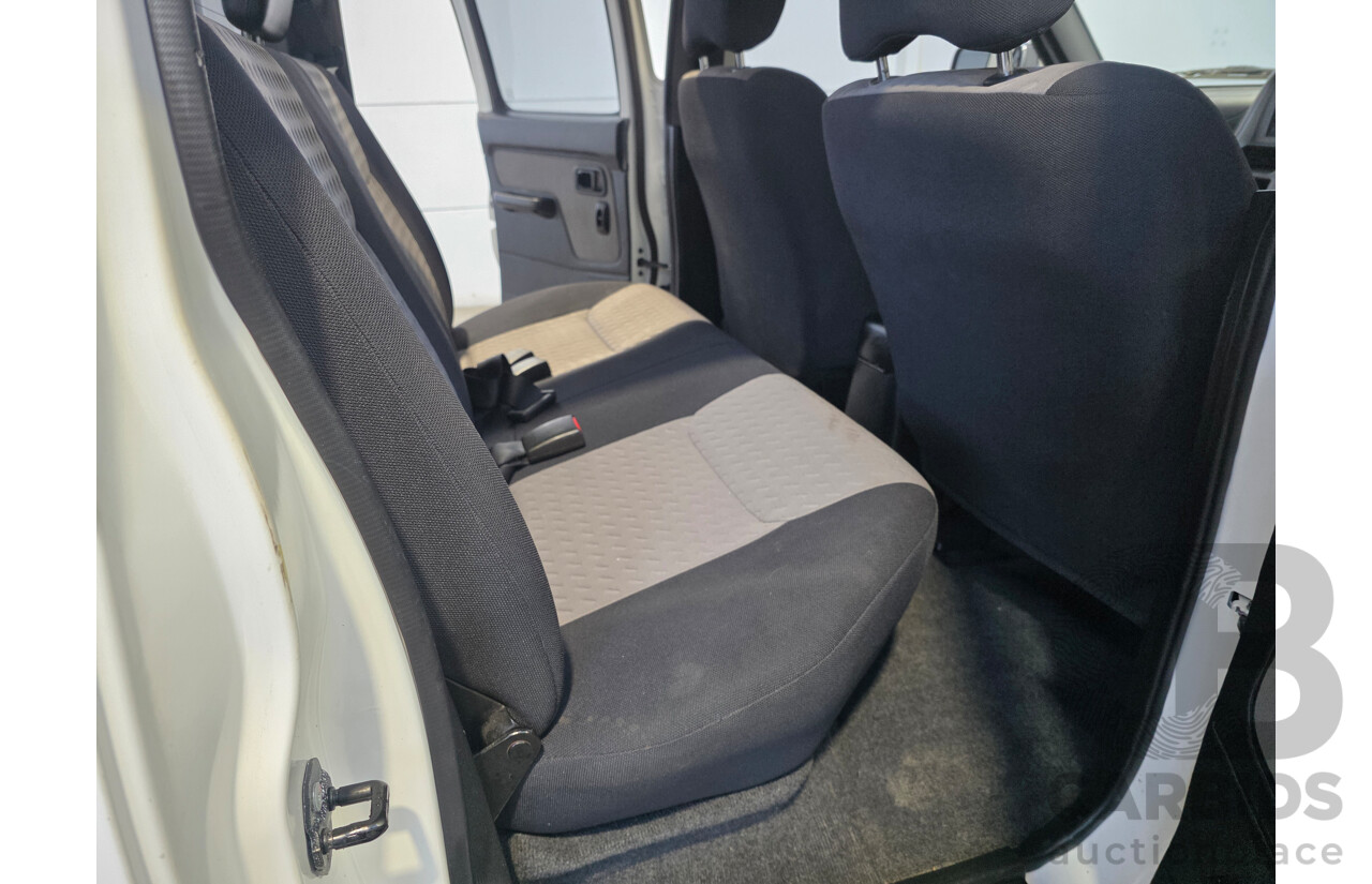 2/2012 Nissan Navara ST-R 4x4 D22 Series 5 Dual Cab White 2.5L