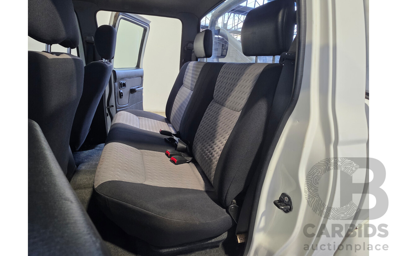 2/2012 Nissan Navara ST-R 4x4 D22 Series 5 Dual Cab White 2.5L