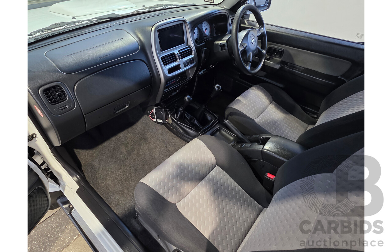 2/2012 Nissan Navara ST-R 4x4 D22 Series 5 Dual Cab White 2.5L