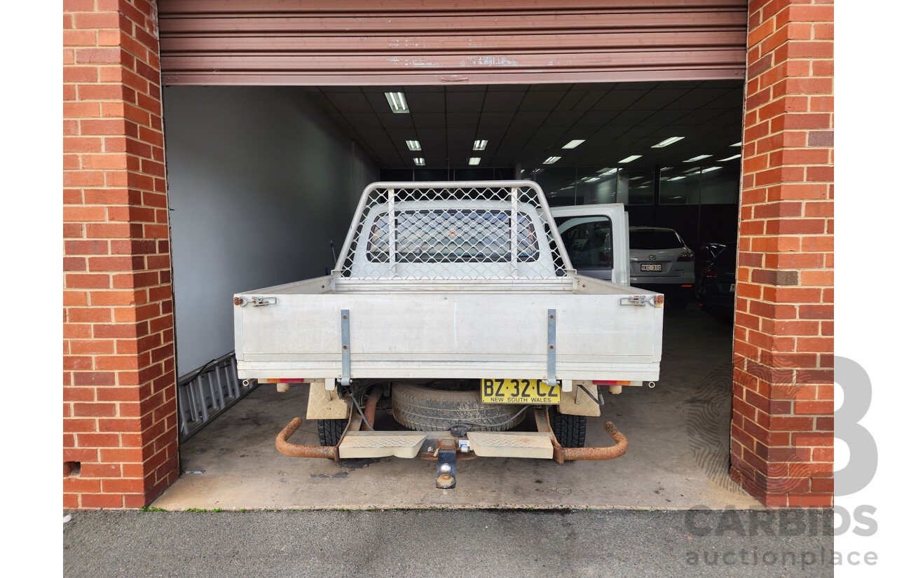 12/2001 Ford Courier GL (4x4) PE Crew Cab P/Up White 2.5L