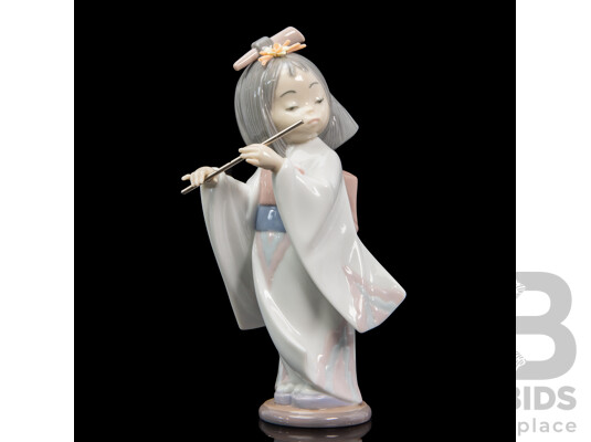 Boxed Lladro 'Playing the Flute' Porcelain Figure
