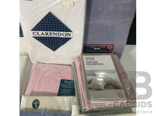 Collection of Linen Including Bed Sheets and Pillowcases