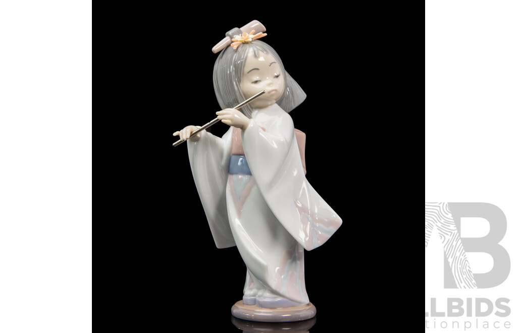 Boxed Lladro 'Playing the Flute' Porcelain Figure