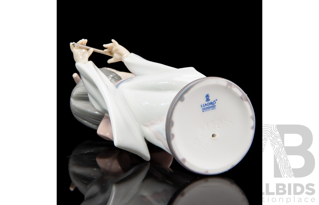 Boxed Lladro 'Playing the Flute' Porcelain Figure