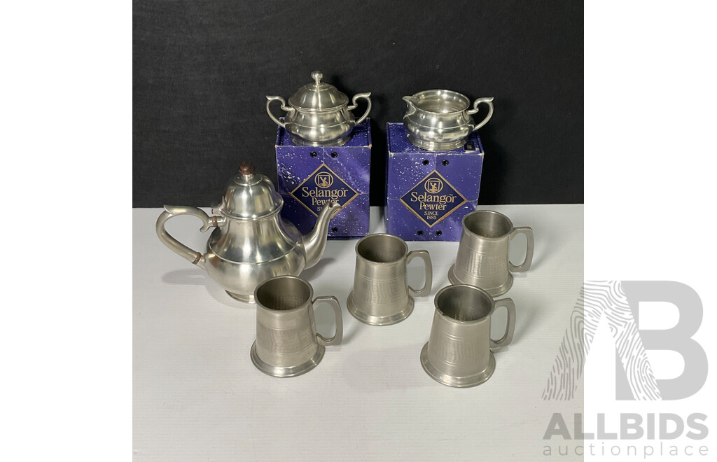 Collection of Selangor Pewter Cups and Teapot