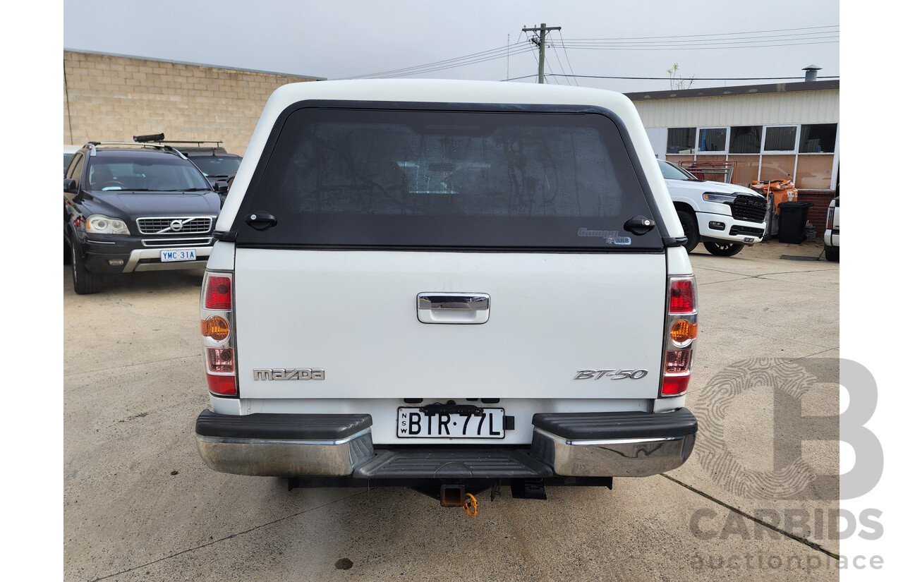 11/2010 Mazda Bt50 BOSS B3000 SDX (4x4) 09 UPGRADE Dual Cab P/Up White 3.0L