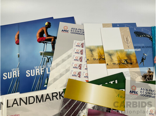 Twenty Eight Australian Mint Stamp Packs Including APEC, Year of the Surf Life Saver, Australian Special Air Service, Land Marks, Howzat!, Australian Legends and More Face Value Approximately $144