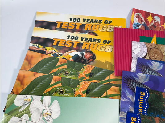 Sixty Five Australian Mint Stamp Packs Including Joint Issues, 100 Years Test Rugby, Perth Mint Centenary, Endangered Birds and More, Face Value Approximately $180