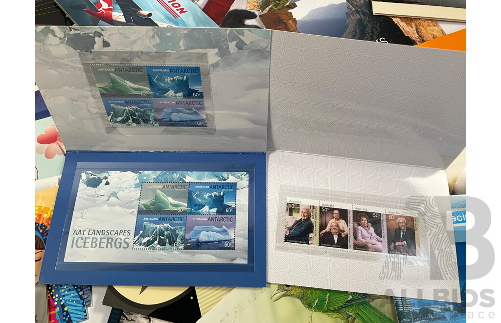 Fifty Six Australian Mint Stamp Packs Including Queensland 150 Years, Stargazing, Species at Risk, with Love, Beijing 2008, Gorgeous Australia, Living Green, Australian Commonwealth Coinage and More Face Value Approximately $217