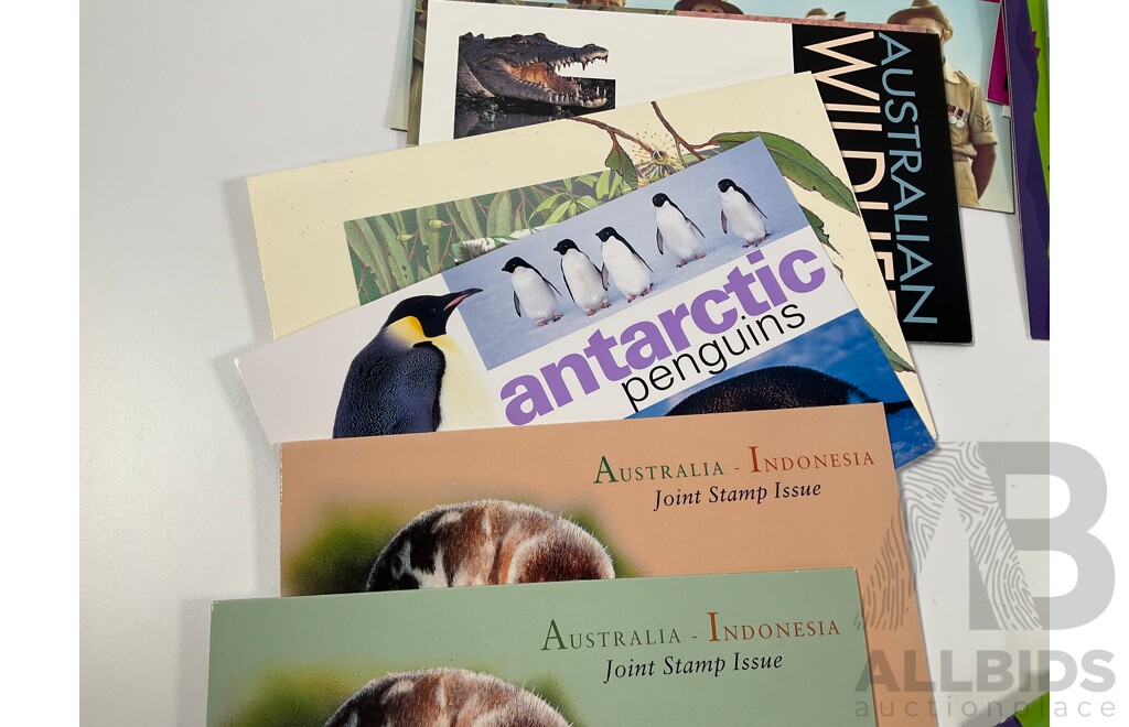 Collection of Australian Mint Stamp Packs, Mostly 2000-2002 Including Motor Racing, Thailand Joint Issues, Magic Rain Forest, Sydney/Athens, Arts Festivals, for Valour, Antarctic Penguins and More - Face Value Approximately $130