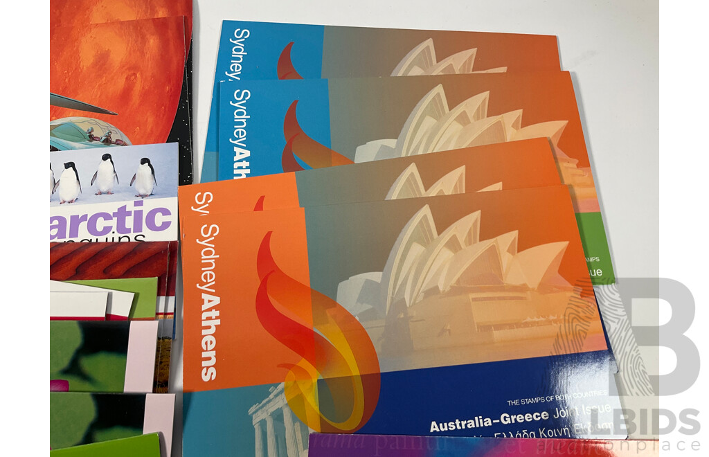 Collection of Australian Mint Stamp Packs, Mostly 2000-2002 Including Motor Racing, Thailand Joint Issues, Magic Rain Forest, Sydney/Athens, Arts Festivals, for Valour, Antarctic Penguins and More    - Face Value Approximately $130