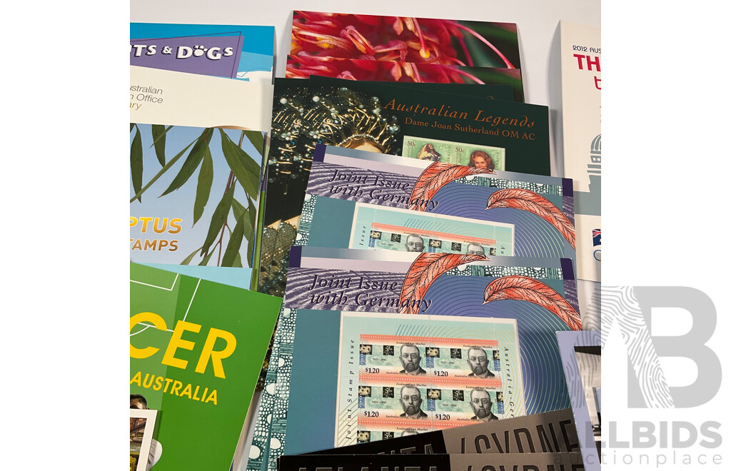 Forty Three Australian Mint Stamp Packs Including Captain Cook, QE2, Rock Posters, Navy, Australian Legends, Blooms, Farewell Frama, Cats & Dogs, Down on the Farm and More Face Value Approximately $250