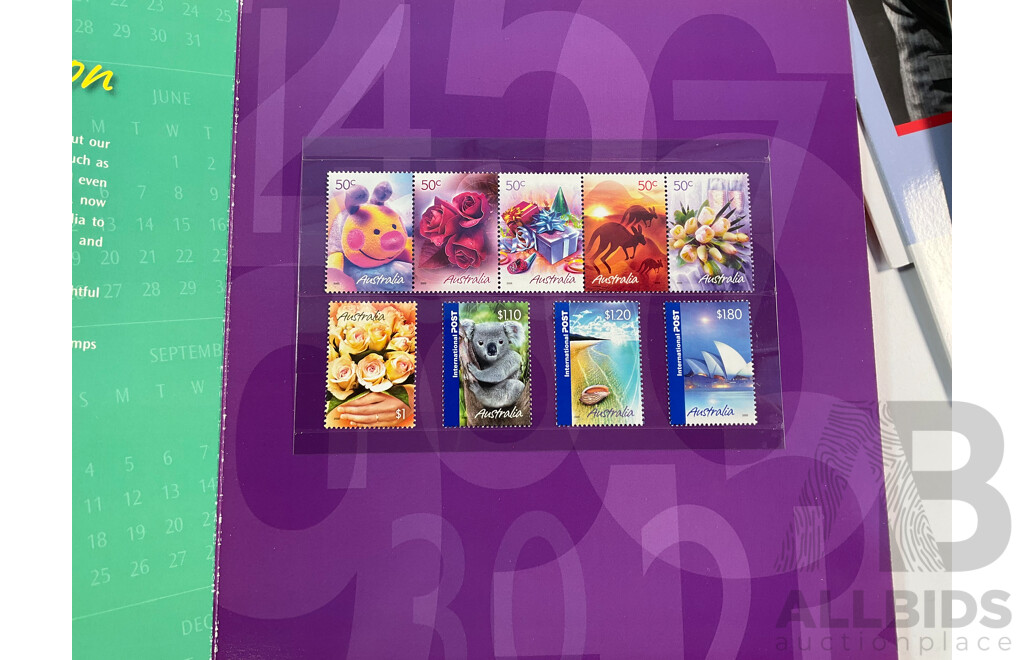 Forty Three Australian Mint Stamp Packs Including Captain Cook, QE2, Rock Posters, Navy, Australian Legends, Blooms, Farewell Frama, Cats & Dogs, Down on the Farm and More Face Value Approximately $250
