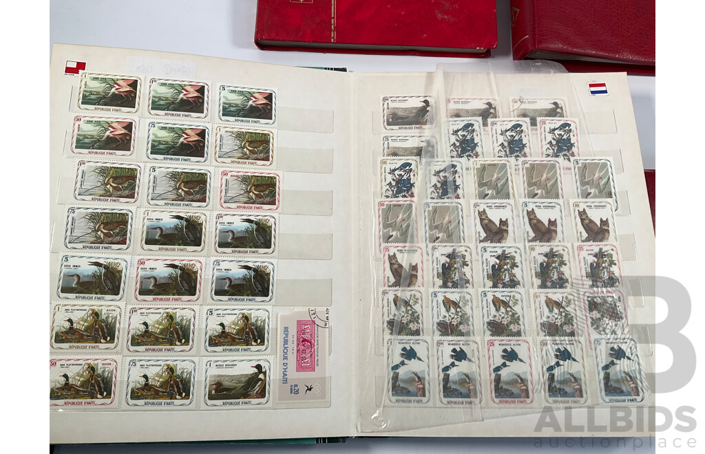 Four Albums of Vintage International Stamps Including Australia, Christmas Island, Haiti, Mexico, Umm Al Quwain, Volta, Niger, Seiyun, New Zealand Seven Seas Hingless Pages 1981 to 1987