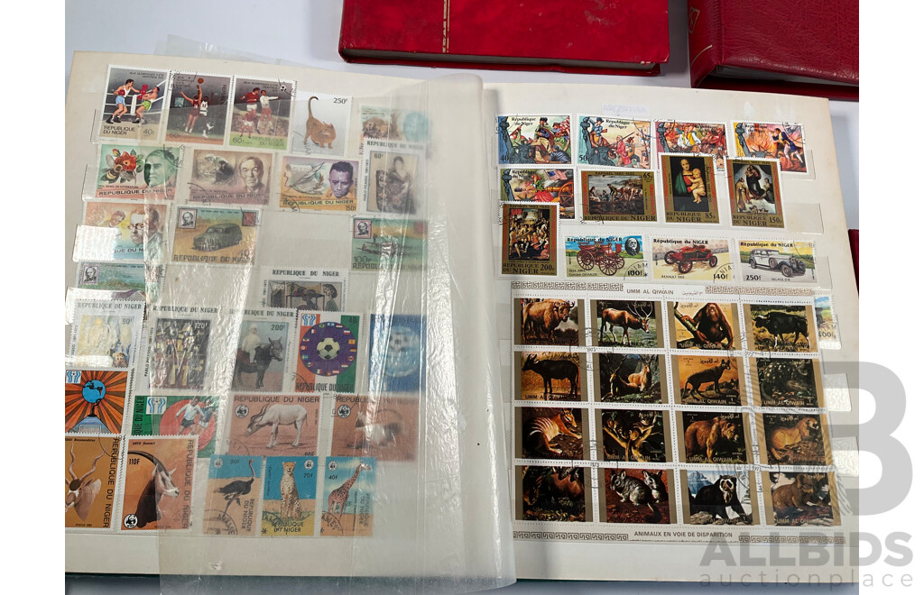 Four Albums of Vintage International Stamps Including Australia, Christmas Island, Haiti, Mexico, Umm Al Quwain, Volta, Niger, Seiyun, New Zealand Seven Seas Hingless Pages 1981 to 1987