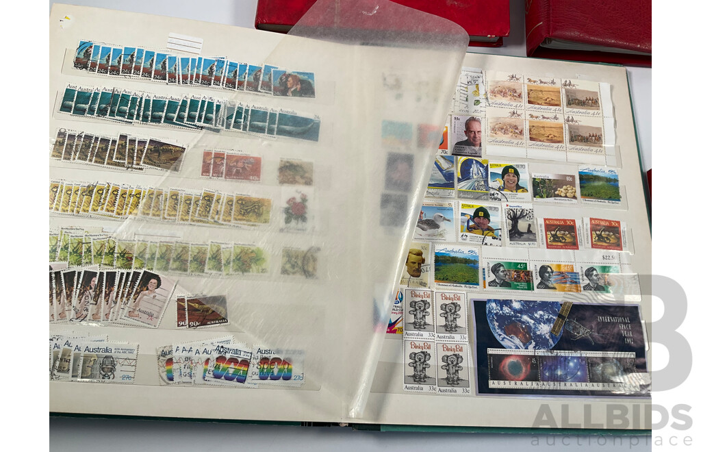 Four Albums of Vintage International Stamps Including Australia, Christmas Island, Haiti, Mexico, Umm Al Quwain, Volta, Niger, Seiyun, New Zealand Seven Seas Hingless Pages 1981 to 1987