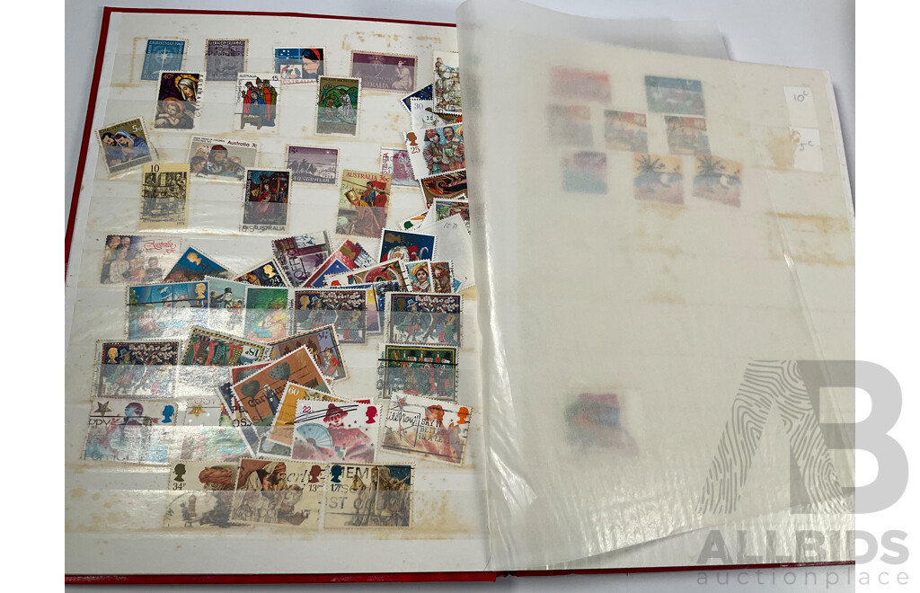 Four Albums of Vintage International Stamps Including Australia, Christmas Island, Haiti, Mexico, Umm Al Quwain, Volta, Niger, Seiyun, New Zealand Seven Seas Hingless Pages 1981 to 1987