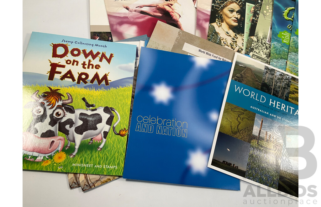 Collection of Australian Stamp Packs Including Soccer, Rock Posters, Joint Issues, 1954 Royal Jubilee Tour and More - Face Value Approximately $207