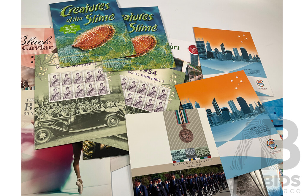 Collection of Australian Stamp Packs Including Soccer, Rock Posters, Joint Issues, 1954 Royal Jubilee Tour and More - Face Value Approximately $207