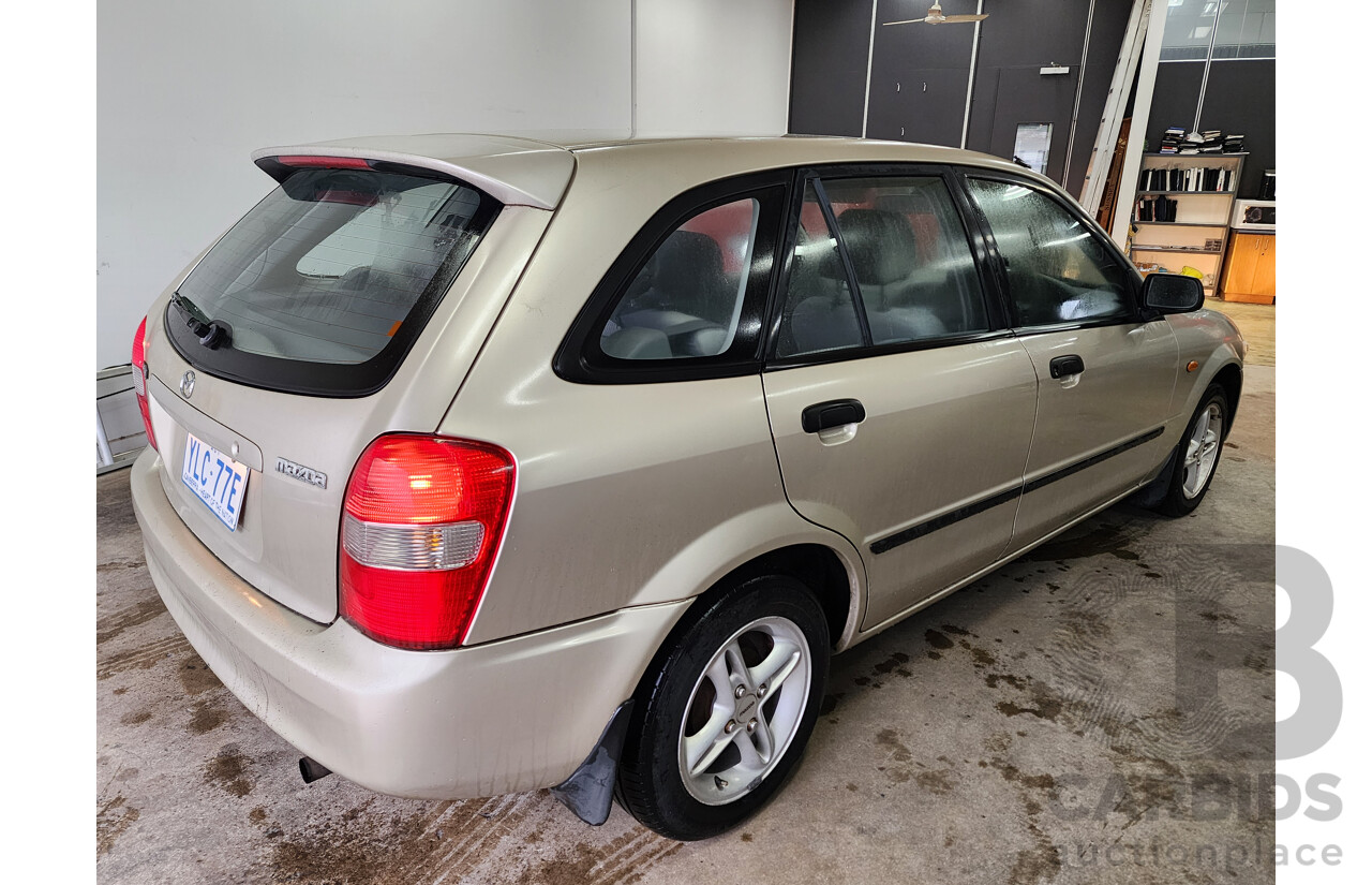 06/2000 Mazda 323 Astina  5d Hatchback Gold 1.6L