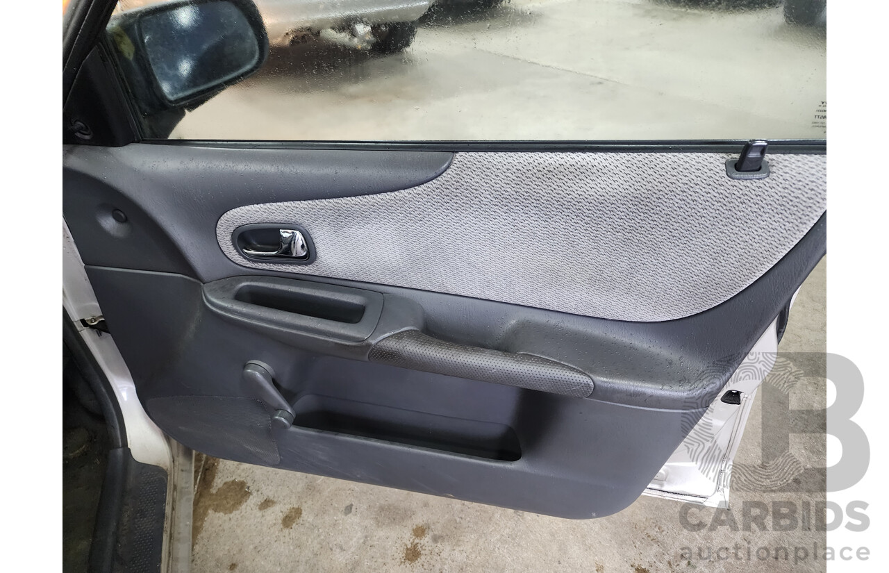 06/2000 Mazda 323 Astina  5d Hatchback Gold 1.6L