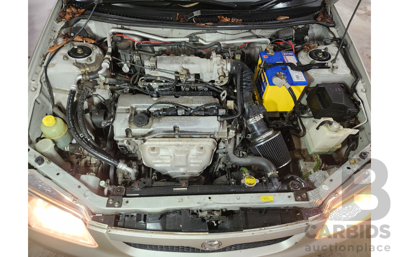 06/2000 Mazda 323 Astina  5d Hatchback Gold 1.6L