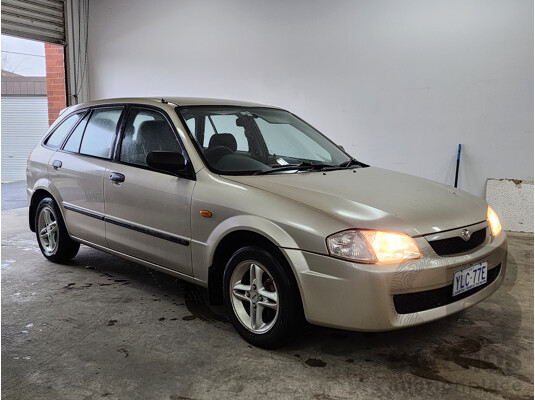 06/2000 Mazda 323 Astina  5d Hatchback Gold 1.6L