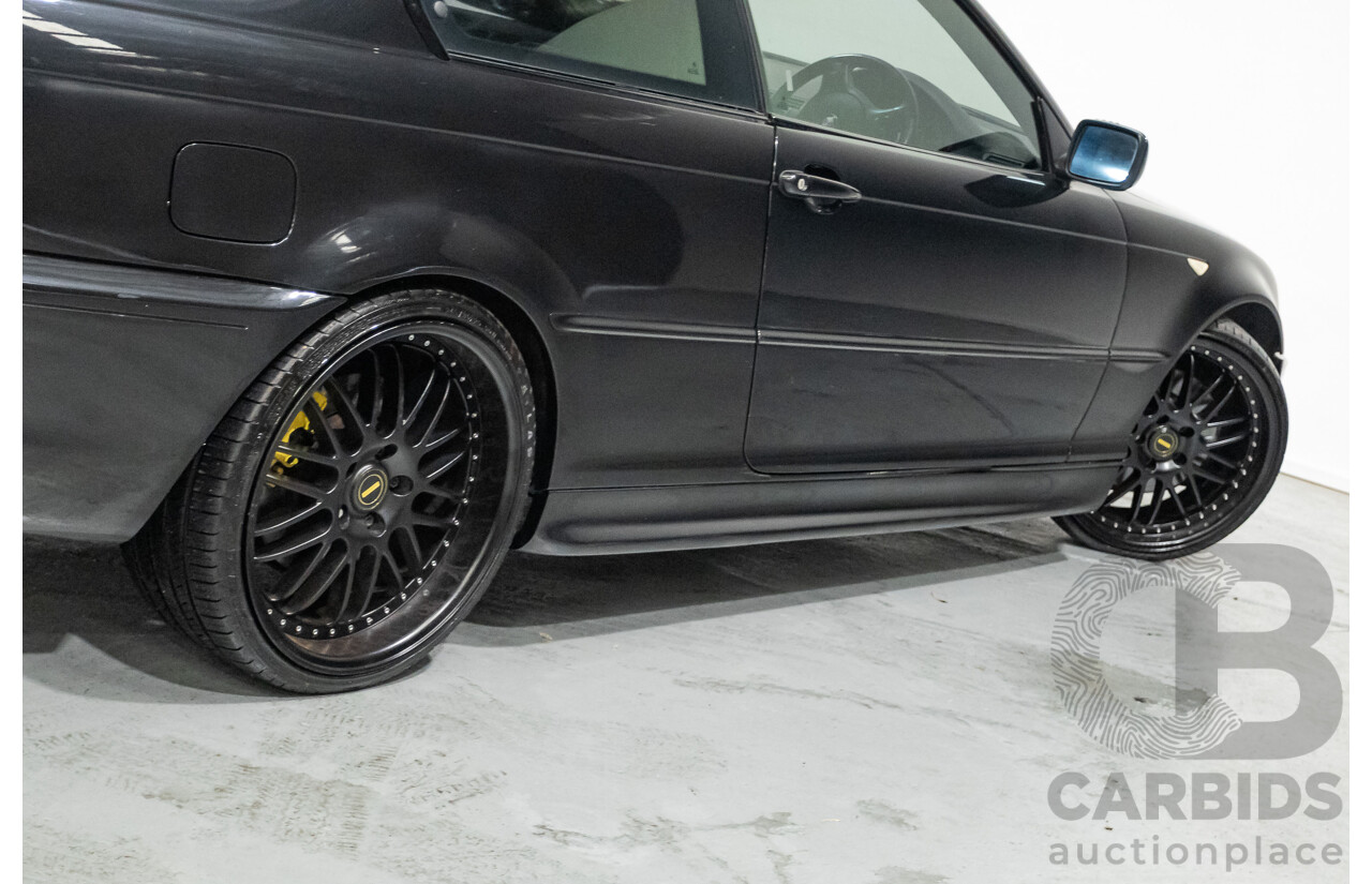 11/2003 BMW 330Ci (RWD) E46 2D Coupe Black Sapphire Metallic 3.0L