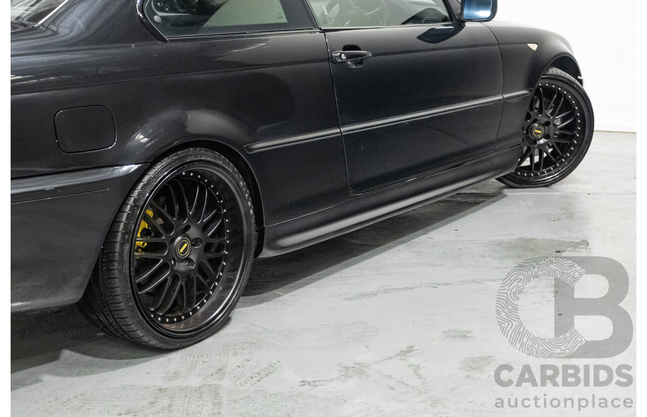 11/2003 BMW 330Ci (RWD) E46 2D Coupe Black Sapphire Metallic 3.0L