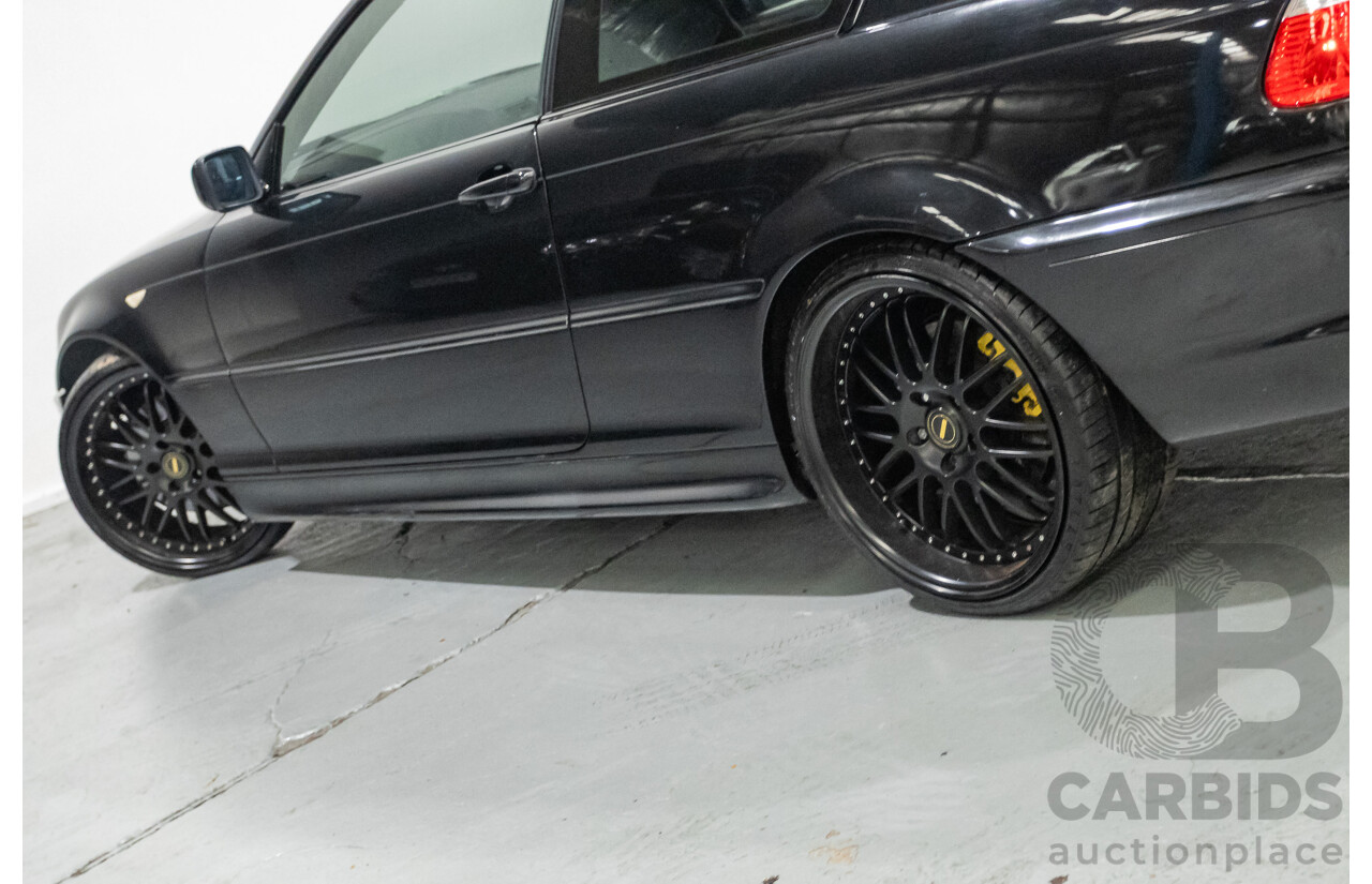 11/2003 BMW 330Ci (RWD) E46 2D Coupe Black Sapphire Metallic 3.0L