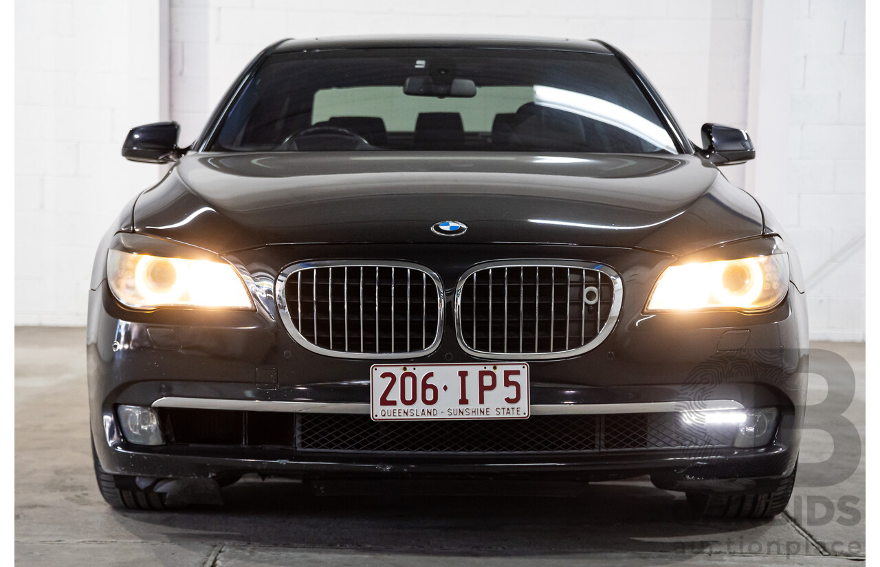 2/2010 BMW 750i F01 4d Sedan Sapphire Black Metallic Twin Turbo V8 4.4L