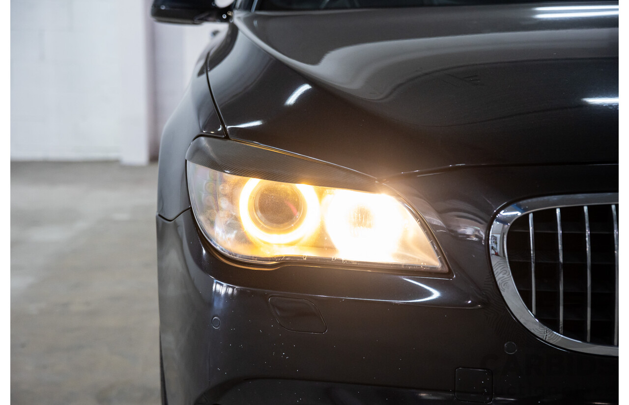 2/2010 BMW 750i F01 4d Sedan Sapphire Black Metallic Twin Turbo V8 4.4L