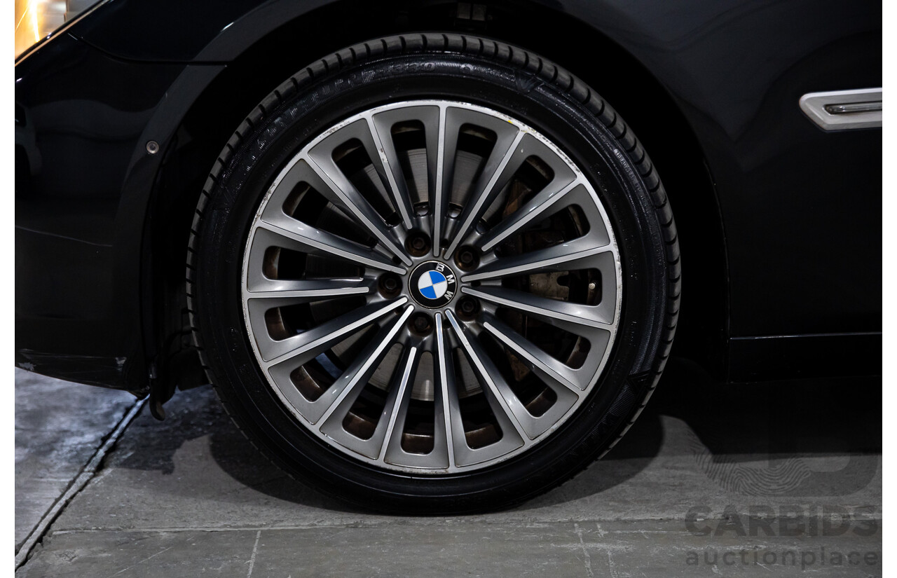 2/2010 BMW 750i F01 4d Sedan Sapphire Black Metallic Twin Turbo V8 4.4L