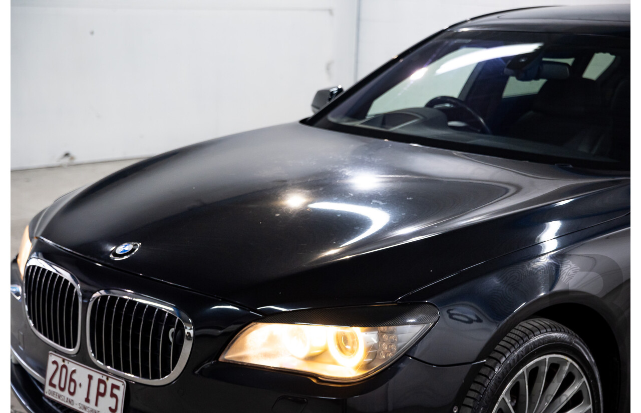 2/2010 BMW 750i F01 4d Sedan Sapphire Black Metallic Twin Turbo V8 4.4L