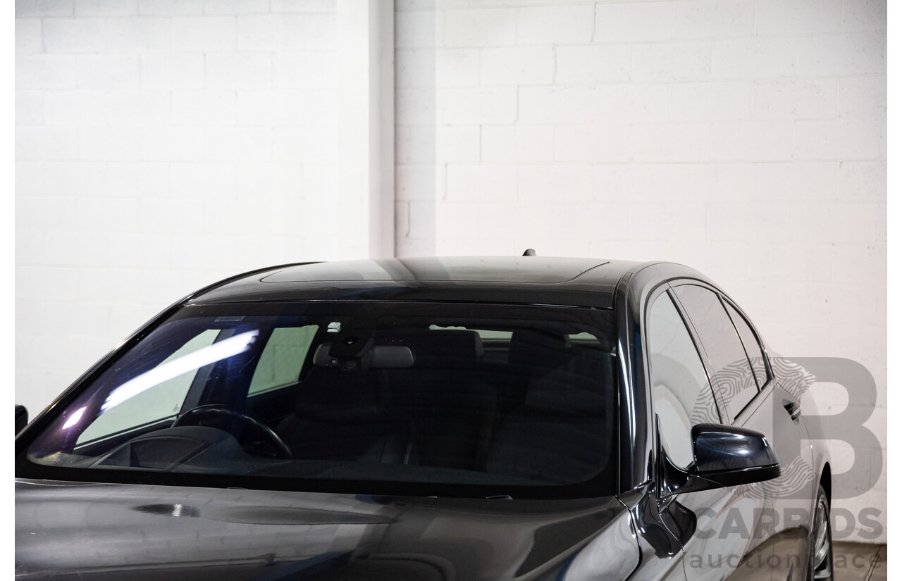 2/2010 BMW 750i F01 4d Sedan Sapphire Black Metallic Twin Turbo V8 4.4L