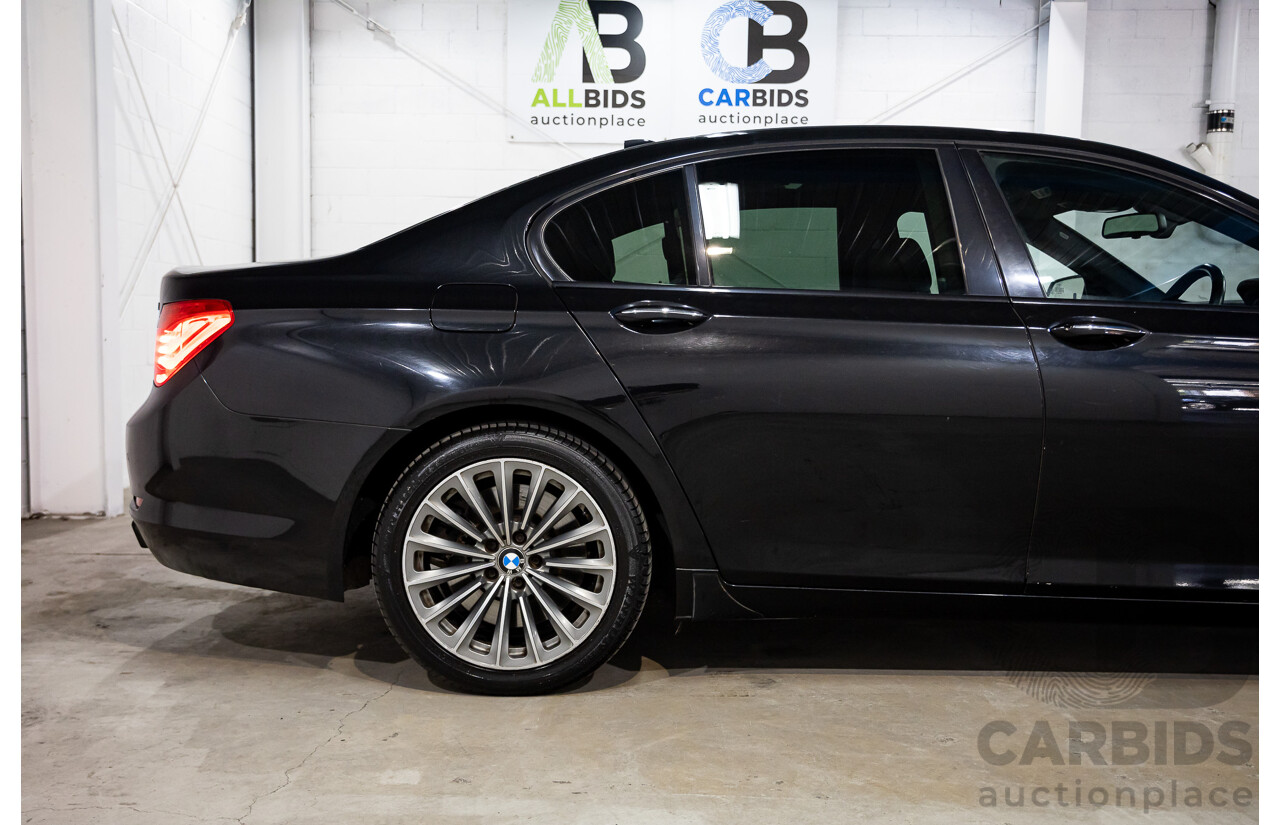 2/2010 BMW 750i F01 4d Sedan Sapphire Black Metallic Twin Turbo V8 4.4L