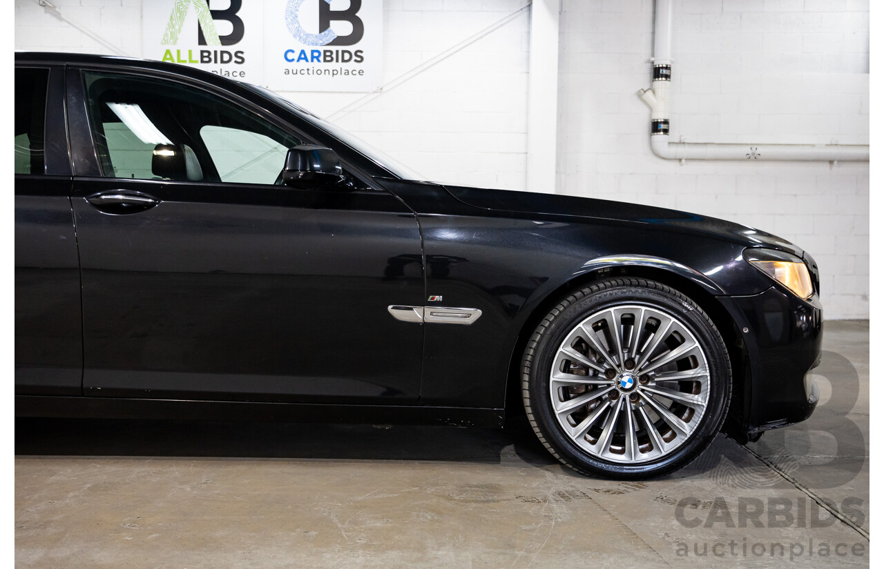 2/2010 BMW 750i F01 4d Sedan Sapphire Black Metallic Twin Turbo V8 4.4L