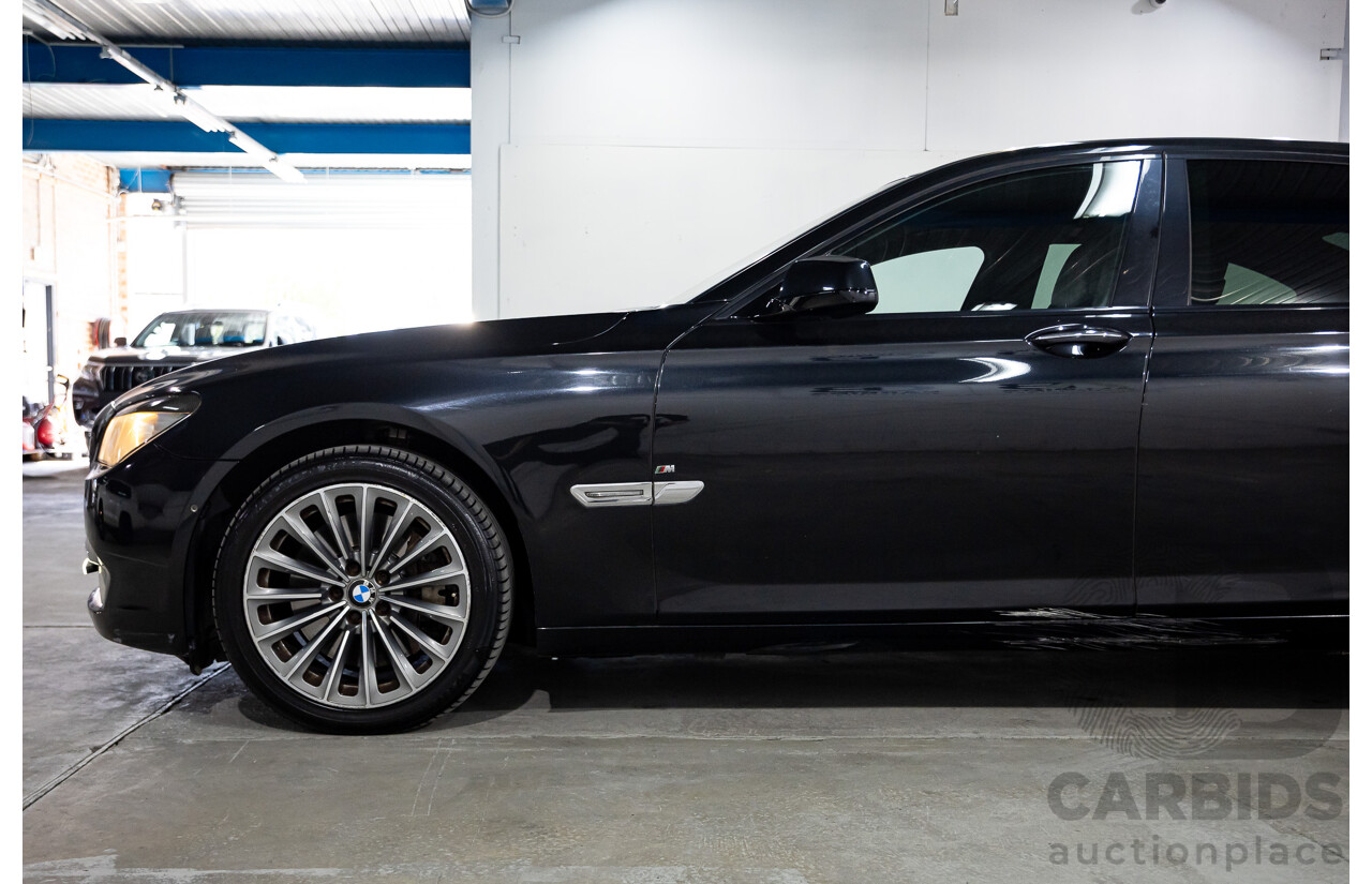 2/2010 BMW 750i F01 4d Sedan Sapphire Black Metallic Twin Turbo V8 4.4L