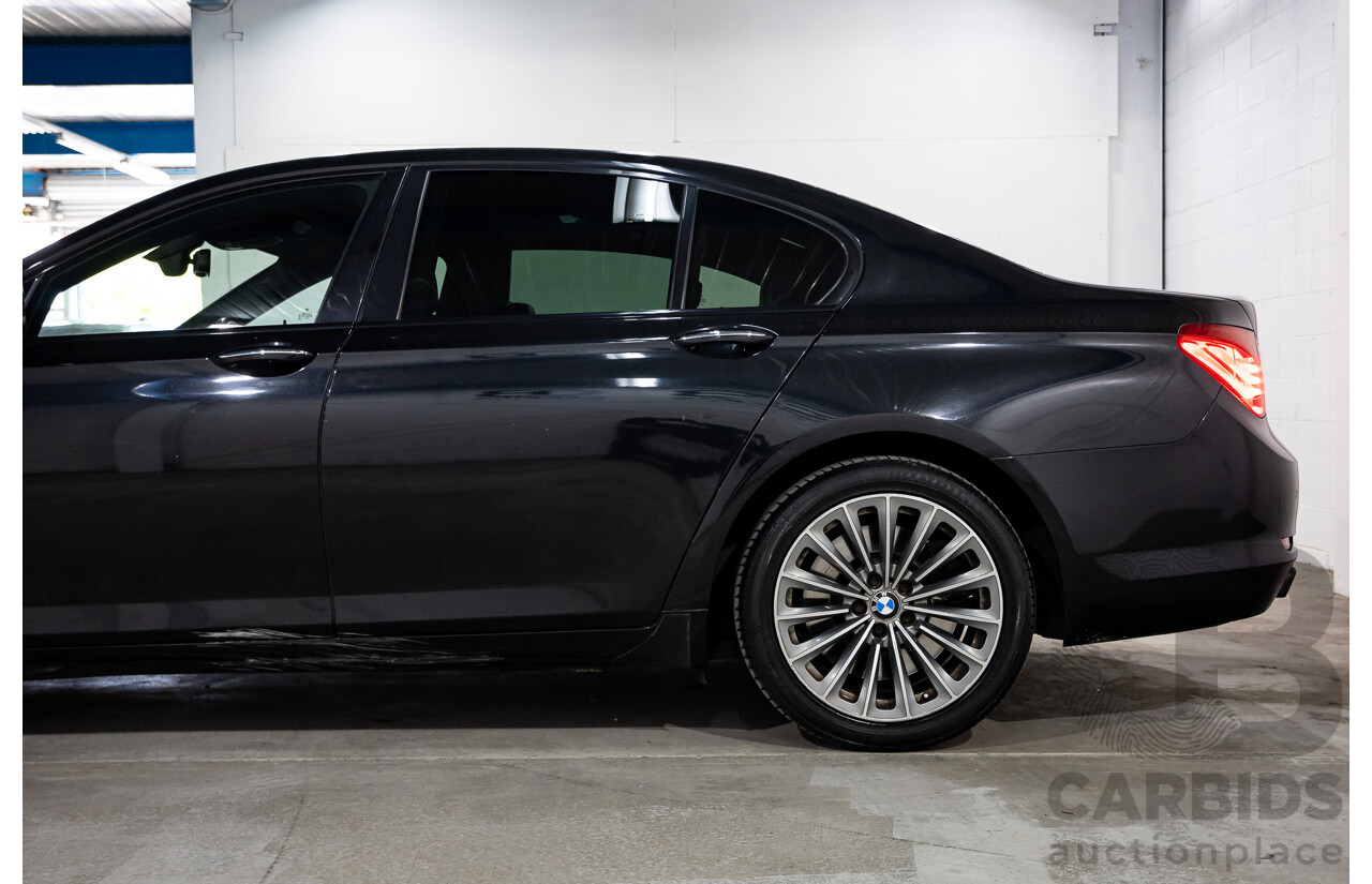 2/2010 BMW 750i F01 4d Sedan Sapphire Black Metallic Twin Turbo V8 4.4L