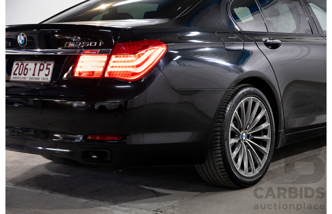 2/2010 BMW 750i F01 4d Sedan Sapphire Black Metallic Twin Turbo V8 4.4L
