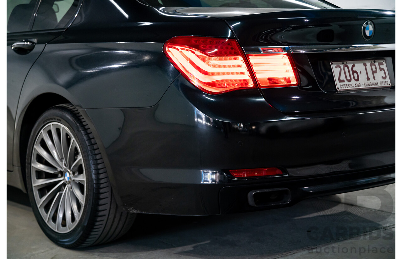 2/2010 BMW 750i F01 4d Sedan Sapphire Black Metallic Twin Turbo V8 4.4L