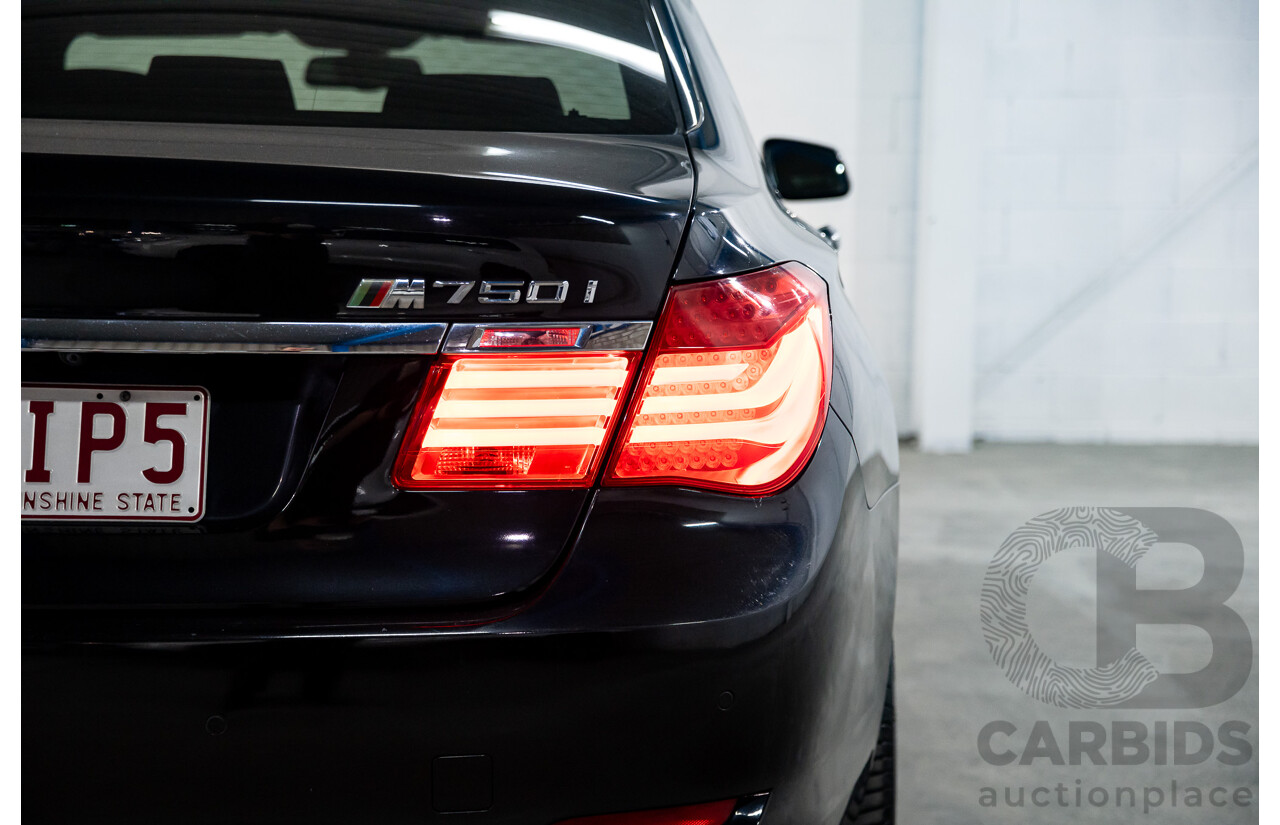 2/2010 BMW 750i F01 4d Sedan Sapphire Black Metallic Twin Turbo V8 4.4L