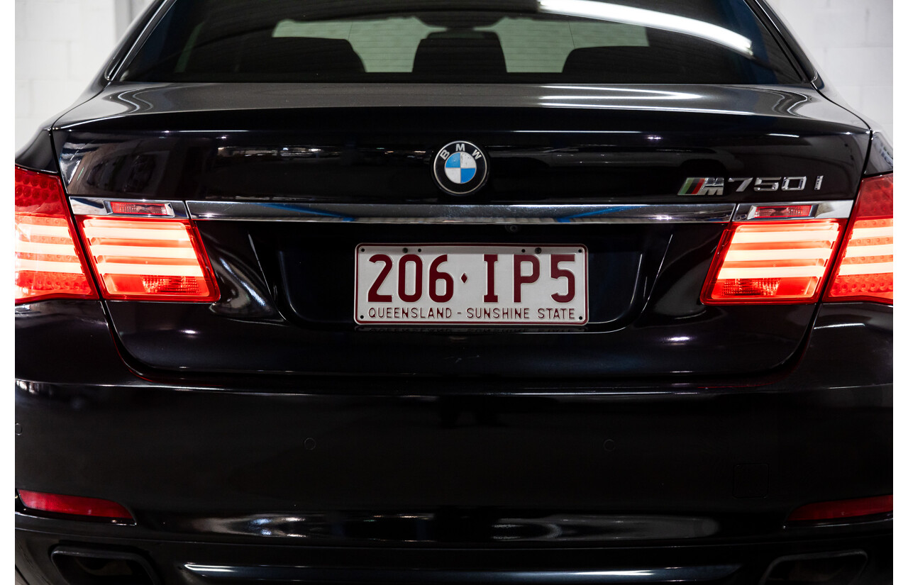 2/2010 BMW 750i F01 4d Sedan Sapphire Black Metallic Twin Turbo V8 4.4L