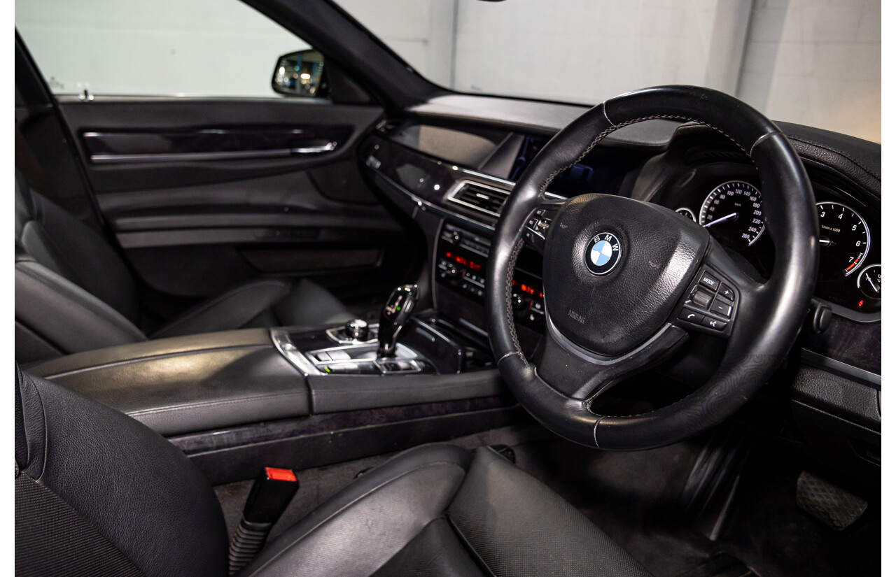 2/2010 BMW 750i F01 4d Sedan Sapphire Black Metallic Twin Turbo V8 4.4L